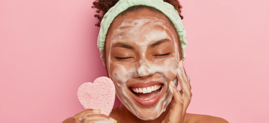 Relaxed,Joyful,Dark,Skinned,Female,Model,Washes,Face,With,Soap