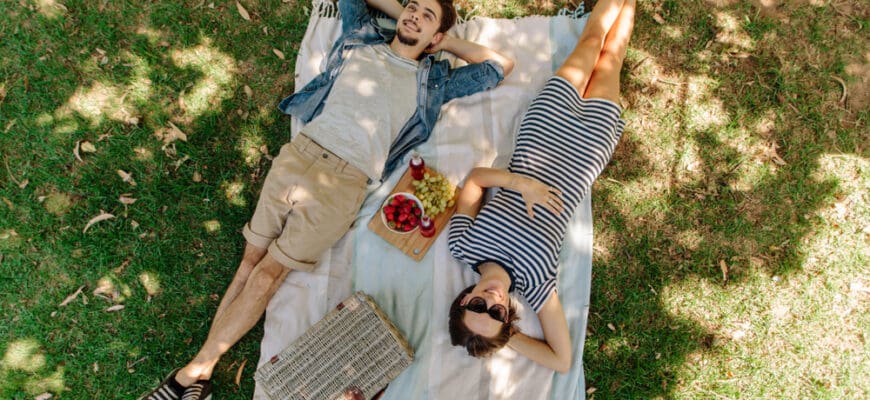 View,From,Above,Of,Relaxed,Man,And,Woman,Lying,Down
