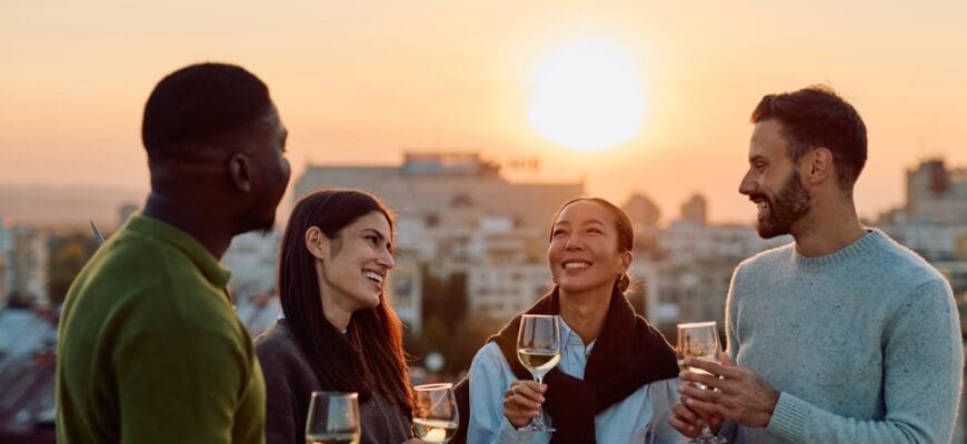 A group of friends at an outdoor restaurant patio